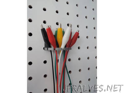 Peg board round cable holder