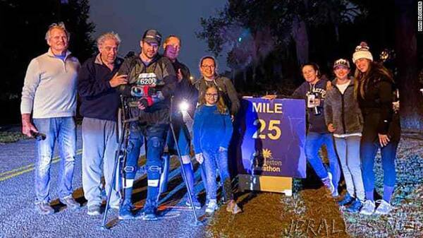 Paralyzed man breaks world record for finishing a marathon in an exoskeleton suit