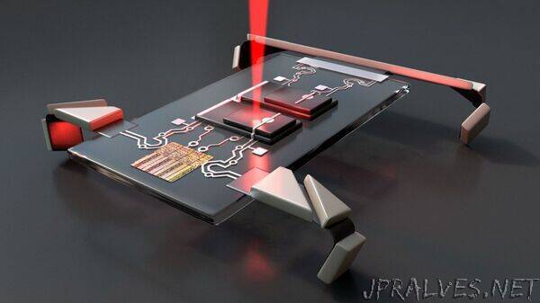 Laser jolts microscopic electronic robots into motion