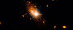 Hubble detects supermassive black hole kicked out of galactic core