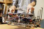 Stanford engineers design a robotic gripper for cleaning up space debris