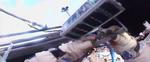 Spacewalking cosmonauts release 3-D-printed satellite