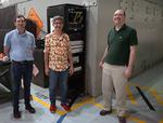 Neutrinos, atomic clocks and an experiment to detect a time dilation