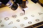 Using artificial intelligence to control digital manufacturing